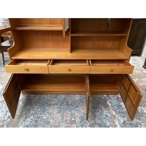 57 - A Nathan Squares teak wall unit - approx. 194cm high x 152cm wide x 45cm deep