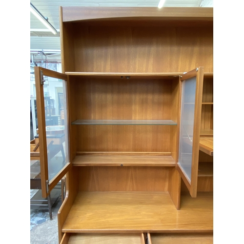 57 - A Nathan Squares teak wall unit - approx. 194cm high x 152cm wide x 45cm deep