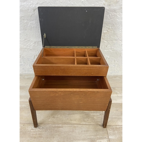 59 - A mid 20th century teak and black painted concertina sewing box - approx. 44cm high x 52cm wide x 30... 