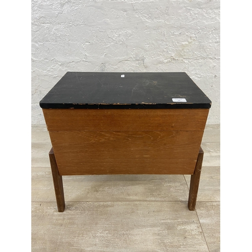 59 - A mid 20th century teak and black painted concertina sewing box - approx. 44cm high x 52cm wide x 30... 