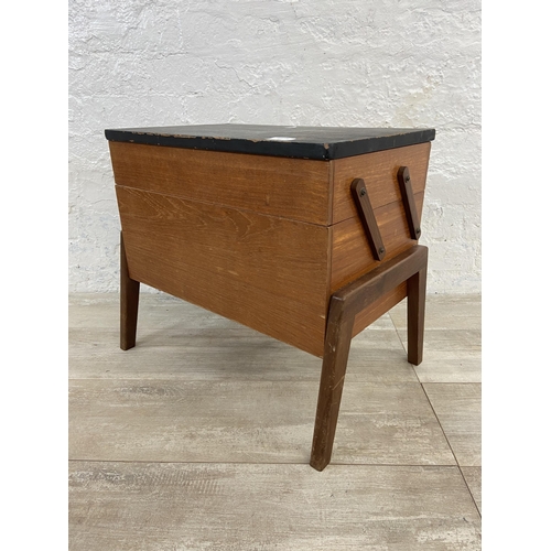 59 - A mid 20th century teak and black painted concertina sewing box - approx. 44cm high x 52cm wide x 30... 