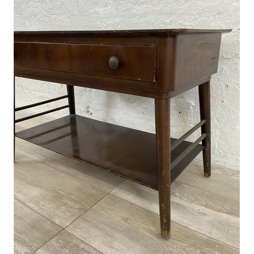 60 - A mid 20th century walnut single drawer two tier coffee table - approx. 52cm high x 40cm wide x 76cm... 