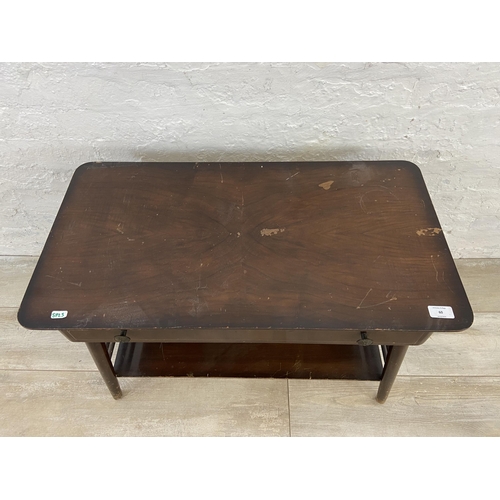 60 - A mid 20th century walnut single drawer two tier coffee table - approx. 52cm high x 40cm wide x 76cm... 