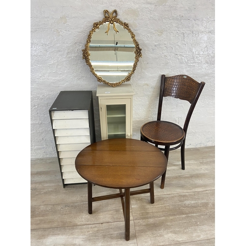 64 - Five items, one gilt framed wall mirror, one oak side table, one white and grey painted ten drawer f... 