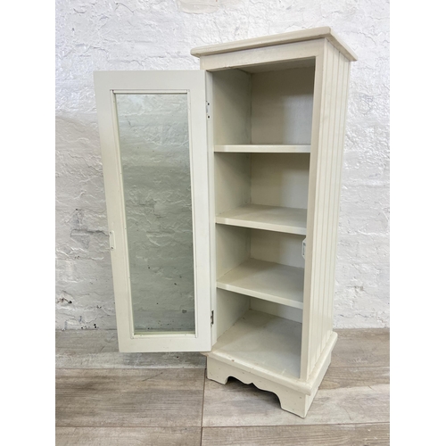 64 - Five items, one gilt framed wall mirror, one oak side table, one white and grey painted ten drawer f... 