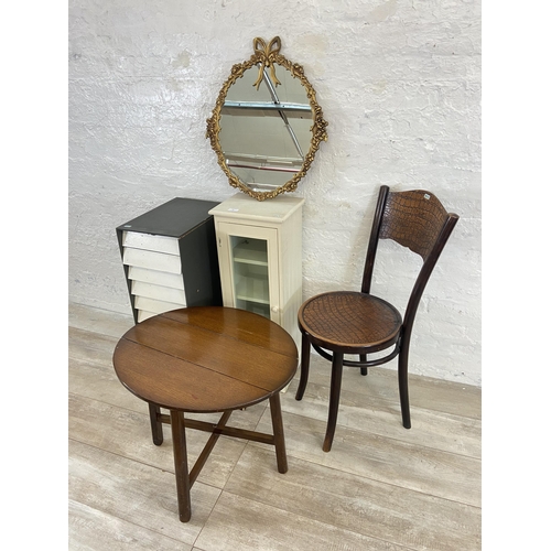 64 - Five items, one gilt framed wall mirror, one oak side table, one white and grey painted ten drawer f... 