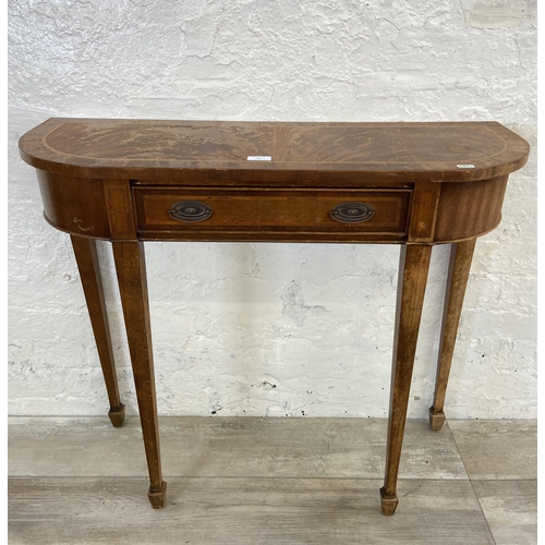 69 - Two occasional tables, one early/mid 20th century oak sewing table and one Regency style inlaid maho... 