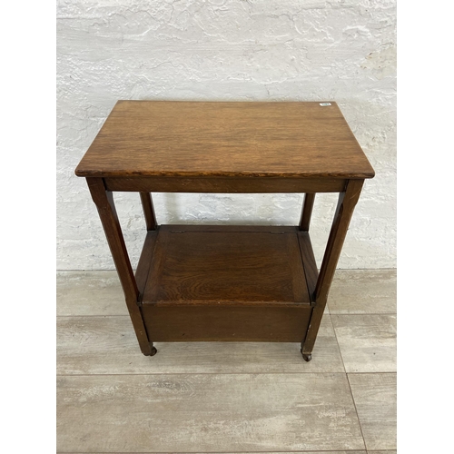 69 - Two occasional tables, one early/mid 20th century oak sewing table and one Regency style inlaid maho... 