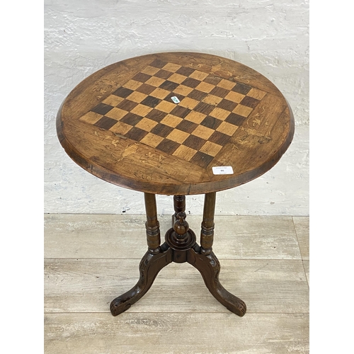 86 - A Victorian inlaid walnut circular tripod pedestal chess table - approx. 66cm high x 53cm diameter