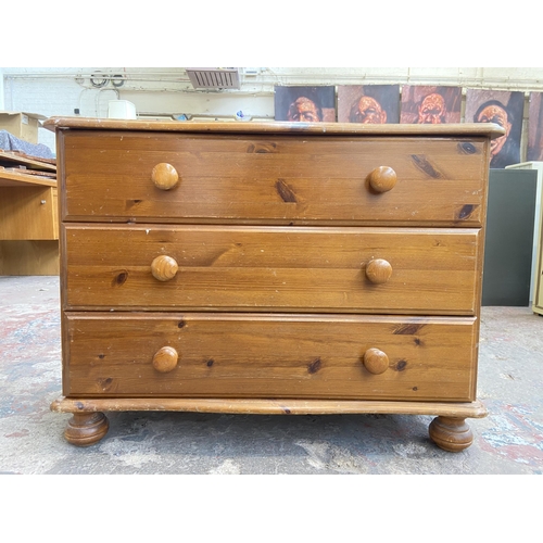 94 - Three pieces of pine furniture, one single door cabinet, one bedside chest of drawers and one chest ... 