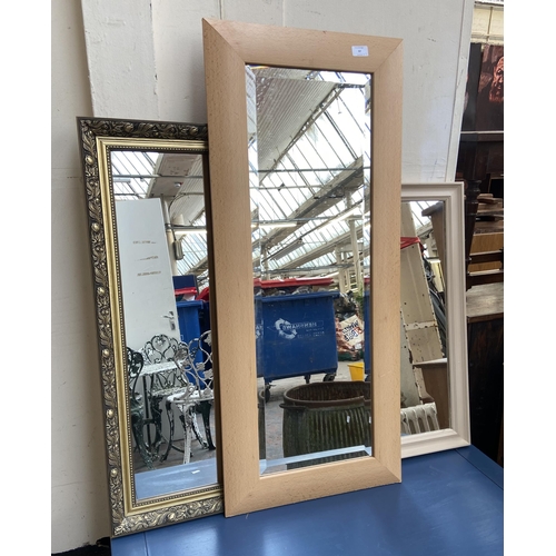 97 - Three framed wall mirrors, one gilt, one beech effect and one painted