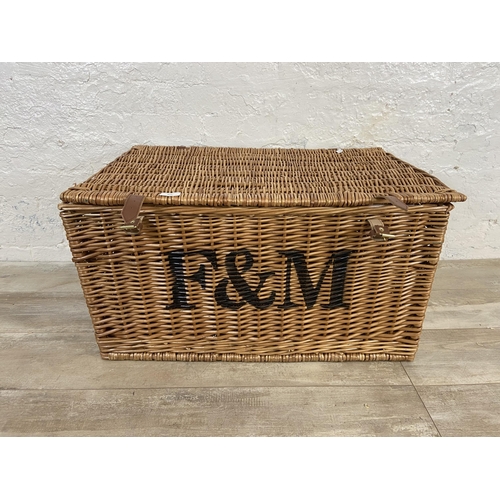 104 - A Fortnum & Mason wicker basket - approx. 42cm high x 78cm wide x 50cm deep