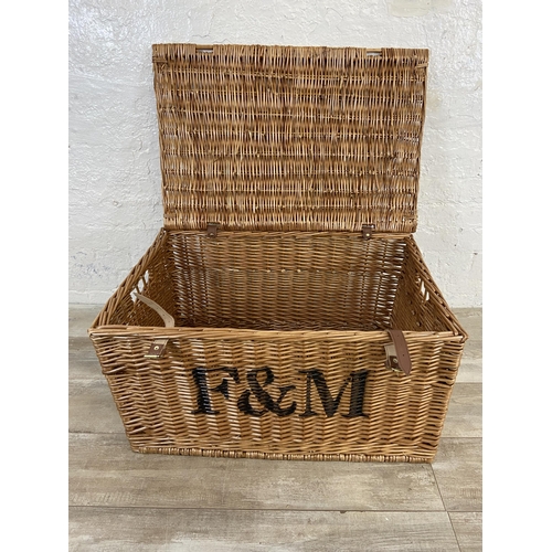 104 - A Fortnum & Mason wicker basket - approx. 42cm high x 78cm wide x 50cm deep