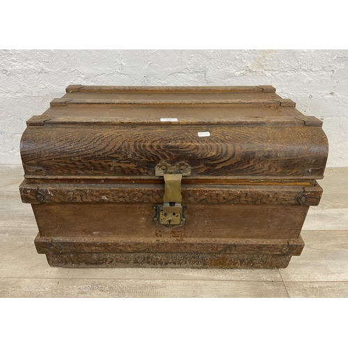 106 - An early 20th century painted metal travel trunk - approx. 43cm high x 66cm wide x 47cm deep