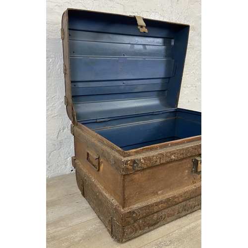 106 - An early 20th century painted metal travel trunk - approx. 43cm high x 66cm wide x 47cm deep