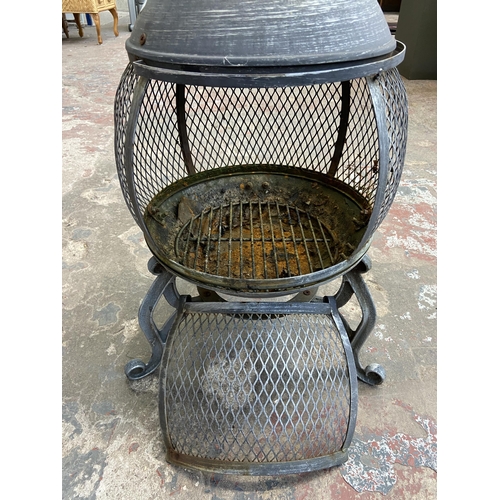 107 - A cast metal garden chiminea - approx. 87cm high