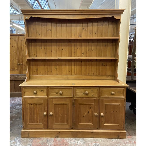 111 - A Victorian style solid pine Welsh dresser - approx. 200cm high x 166cm wide x 47cm deep