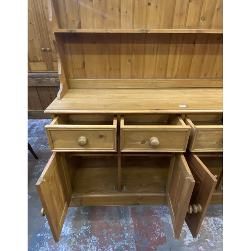 111 - A Victorian style solid pine Welsh dresser - approx. 200cm high x 166cm wide x 47cm deep