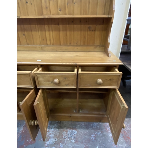 111 - A Victorian style solid pine Welsh dresser - approx. 200cm high x 166cm wide x 47cm deep