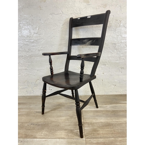 113 - A Victorian stained beech farmhouse armchair