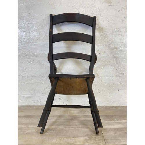 113 - A Victorian stained beech farmhouse armchair