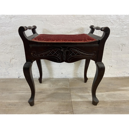 114 - An Edwardian carved mahogany and floral fabric upholstered piano stool - approx. 62cm high x 57cm wi... 