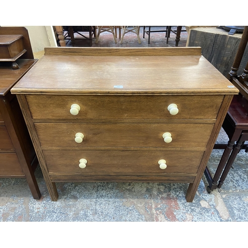 119 - An early 20th century oak chest of drawers - approx. 85cm high x 92cm wide x 44cm deep