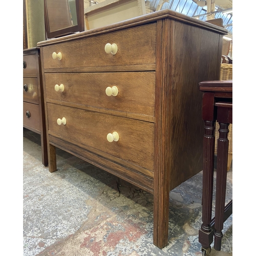 119 - An early 20th century oak chest of drawers - approx. 85cm high x 92cm wide x 44cm deep