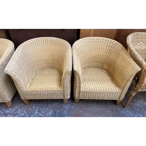 121 - Five pieces of wicker furniture, four armchairs and one sofa