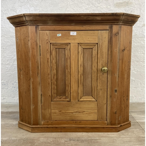 124 - A Victorian pine corner cabinet - approx. 79cm high x 87cm wide x 54cm deep