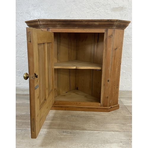 124 - A Victorian pine corner cabinet - approx. 79cm high x 87cm wide x 54cm deep