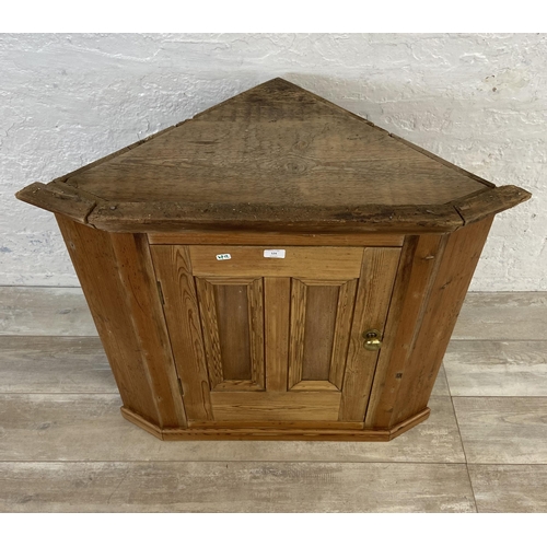 124 - A Victorian pine corner cabinet - approx. 79cm high x 87cm wide x 54cm deep