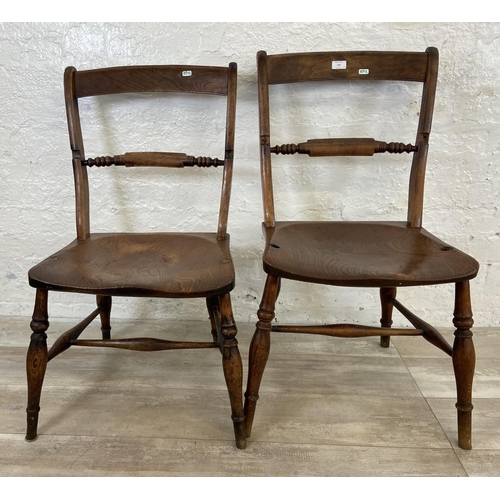 125 - A pair of Victorian elm and beech farmhouse dining chairs