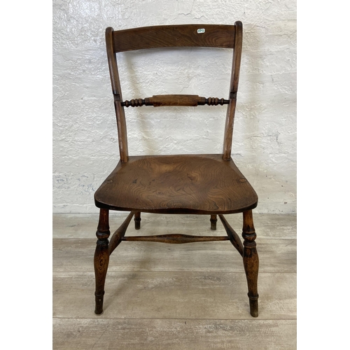 125 - A pair of Victorian elm and beech farmhouse dining chairs