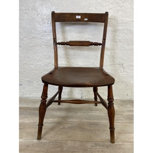 125 - A pair of Victorian elm and beech farmhouse dining chairs