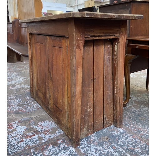 126 - A Victorian pitch pine two door cabinet - approx. 82cm high x 116cm wide x 53cm deep