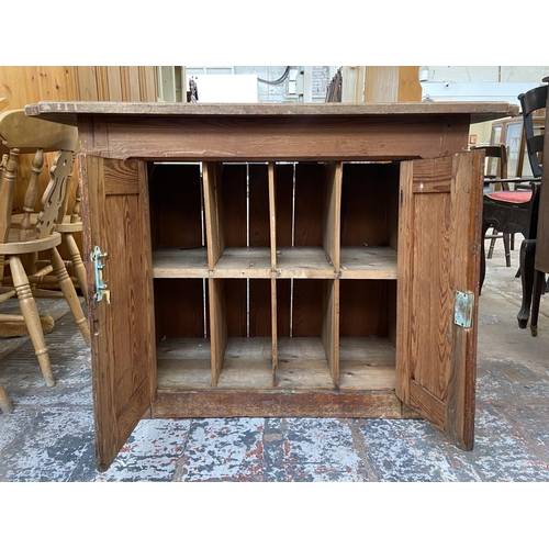 126 - A Victorian pitch pine two door cabinet - approx. 82cm high x 116cm wide x 53cm deep