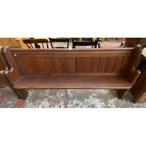 127 - A Victorian pitch pine church pew - approx. 92cm high x 185cm wide x 38cm deep