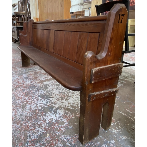 127 - A Victorian pitch pine church pew - approx. 92cm high x 185cm wide x 38cm deep