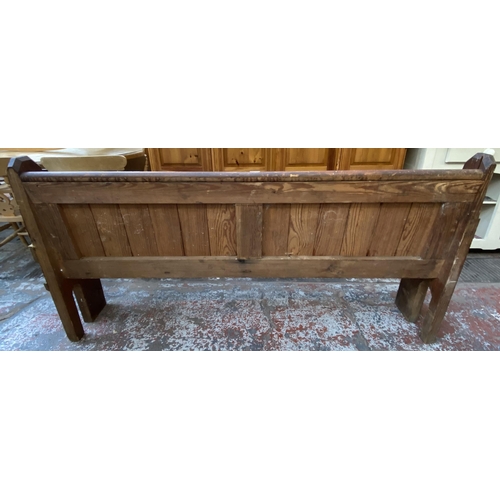 127 - A Victorian pitch pine church pew - approx. 92cm high x 185cm wide x 38cm deep