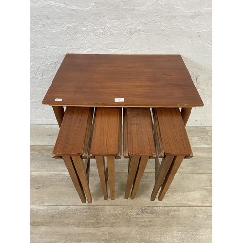 130 - A mid 20th century Poul Hundevad teak nest of tables - approx. 56cm high x 62cm wide x 42cm deep