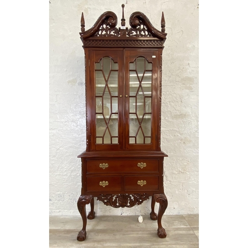 132 - A Georgian style carved mahogany display cabinet on ball and claw supports - approx. 180cm high x 70... 