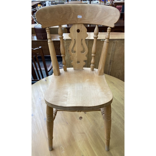 136 - A Victorian style pine circular tripod pedestal dining table and five Victorian style beech farmhous... 