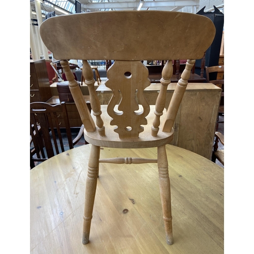 136 - A Victorian style pine circular tripod pedestal dining table and five Victorian style beech farmhous... 