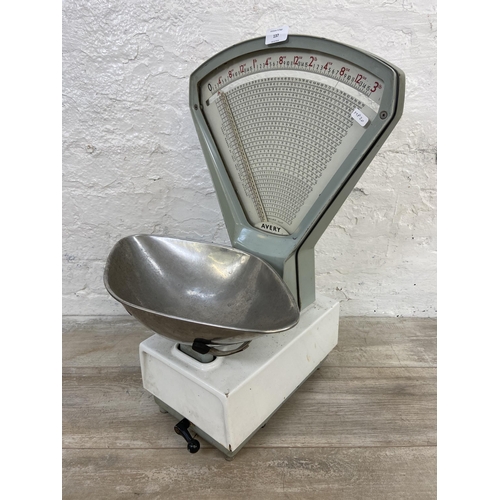 137 - A set of mid 20th century Avery shop weighing scales - approx. 61cm high