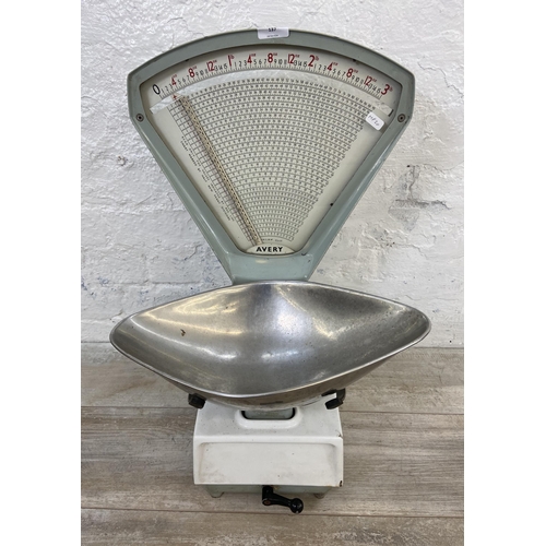 137 - A set of mid 20th century Avery shop weighing scales - approx. 61cm high