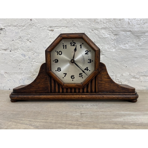 140 - Four early/mid 20th century mantel clocks to include Garrard oak cased, Bravingtons Renown oak cased... 