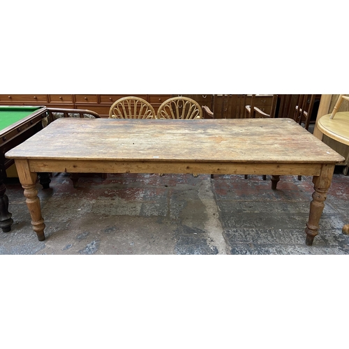 141 - A Victorian pine farmhouse kitchen table with single drawer - approx. 74cm high x 105cm wide x 228cm... 