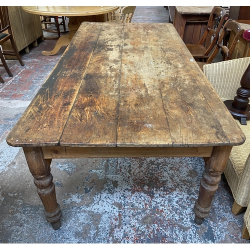 141 - A Victorian pine farmhouse kitchen table with single drawer - approx. 74cm high x 105cm wide x 228cm... 