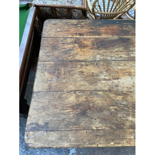 141 - A Victorian pine farmhouse kitchen table with single drawer - approx. 74cm high x 105cm wide x 228cm... 